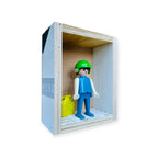 Playmobil huisje 'Blauwwit popje met groene helm en kan'