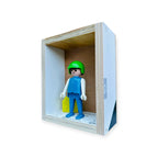 Playmobil huisje 'Blauwwit popje met groene helm en kan'