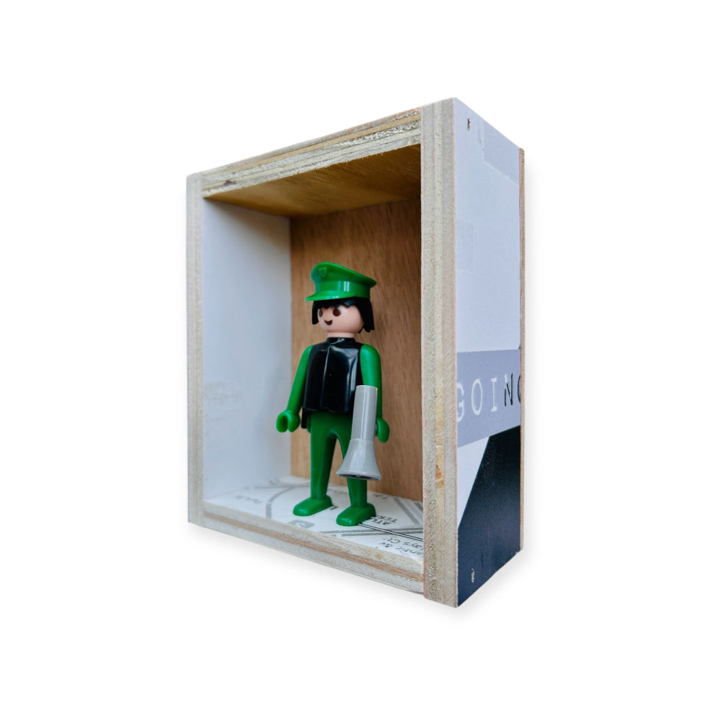 Playmobil huisje 'Groen zwart popje met grijze megafoon'