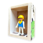 Playmobil huisje 'Blauwwit popje met gele helm'