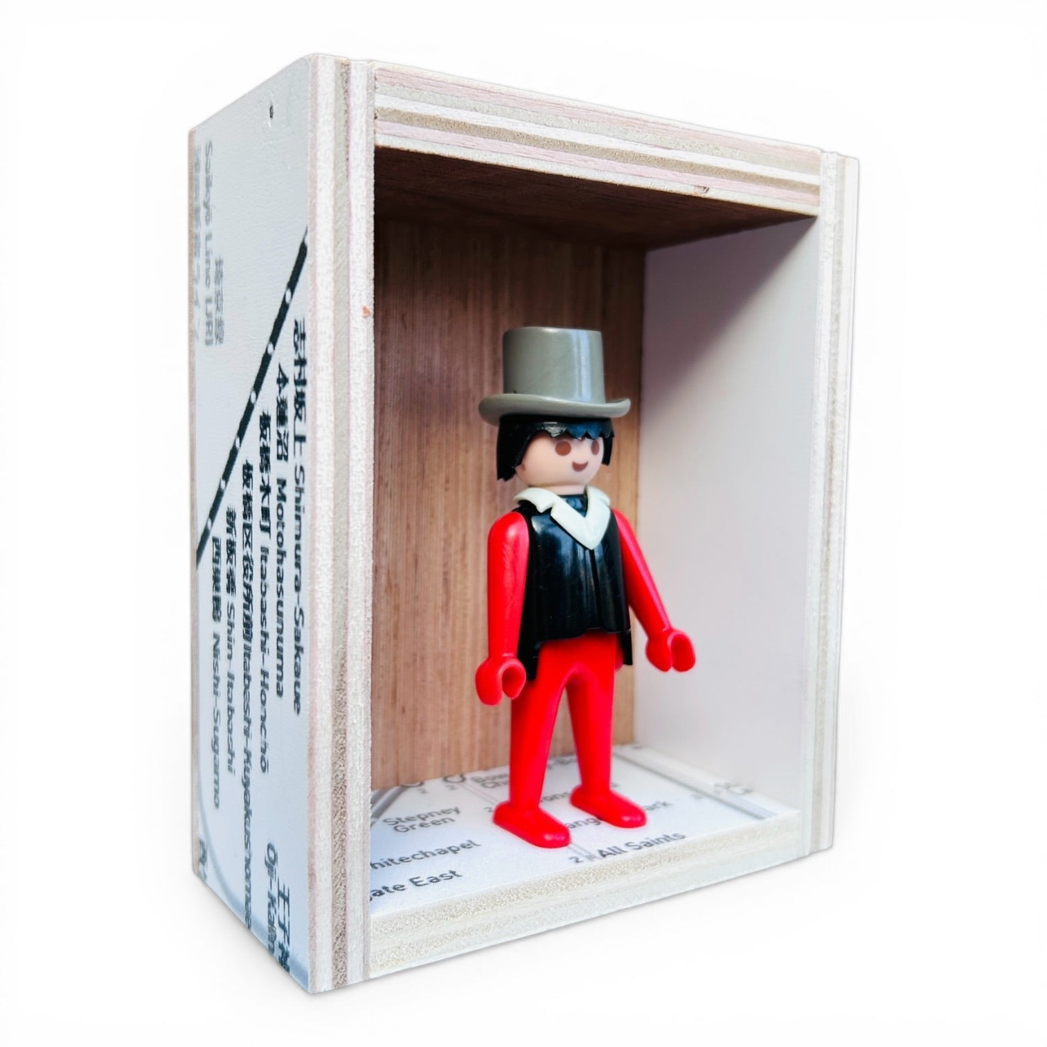 Playmobil huisje 'Zwartrood popje met grijze hoge hoed'