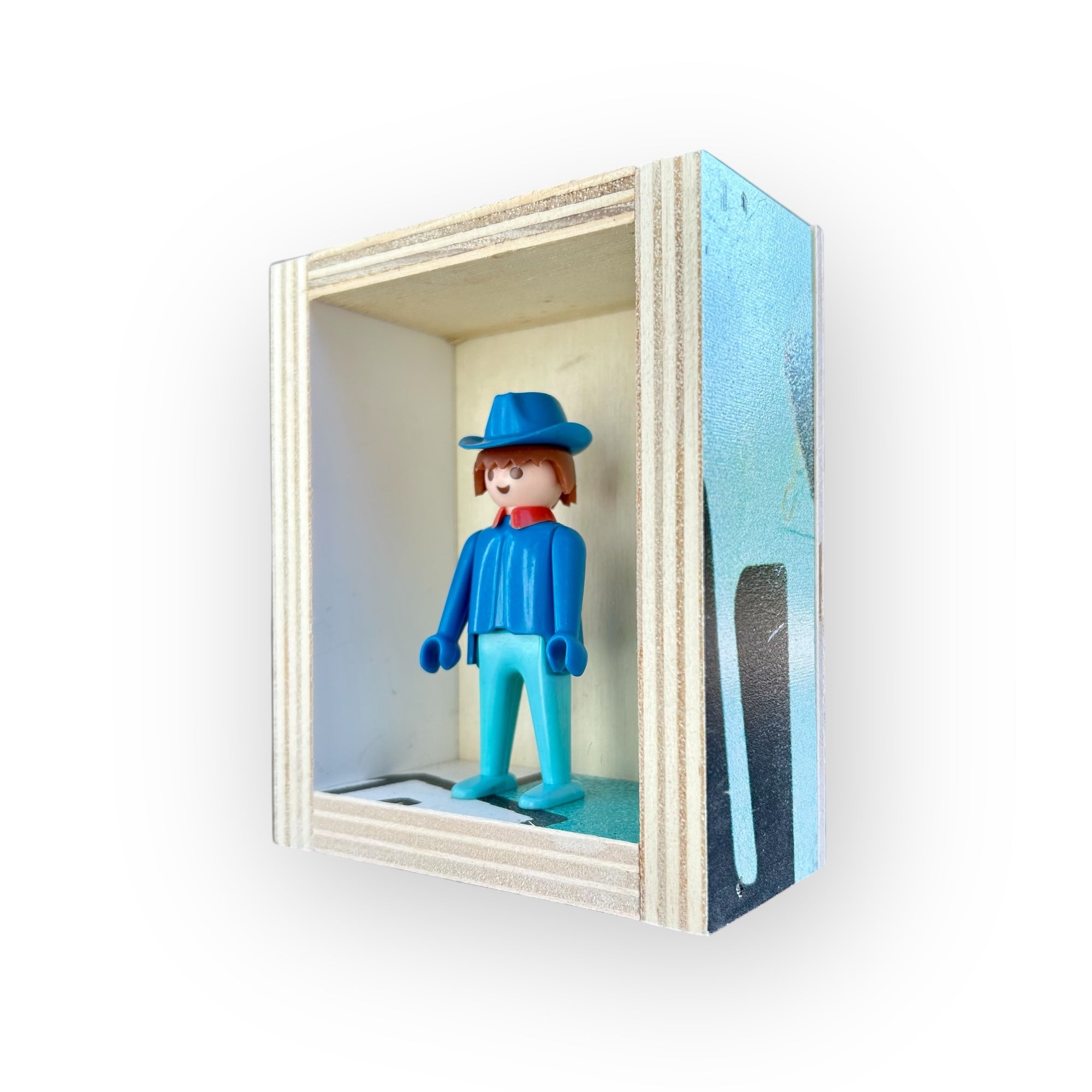Playmobil huisje 'blauw popje met blauwe hoed en rode kraag'