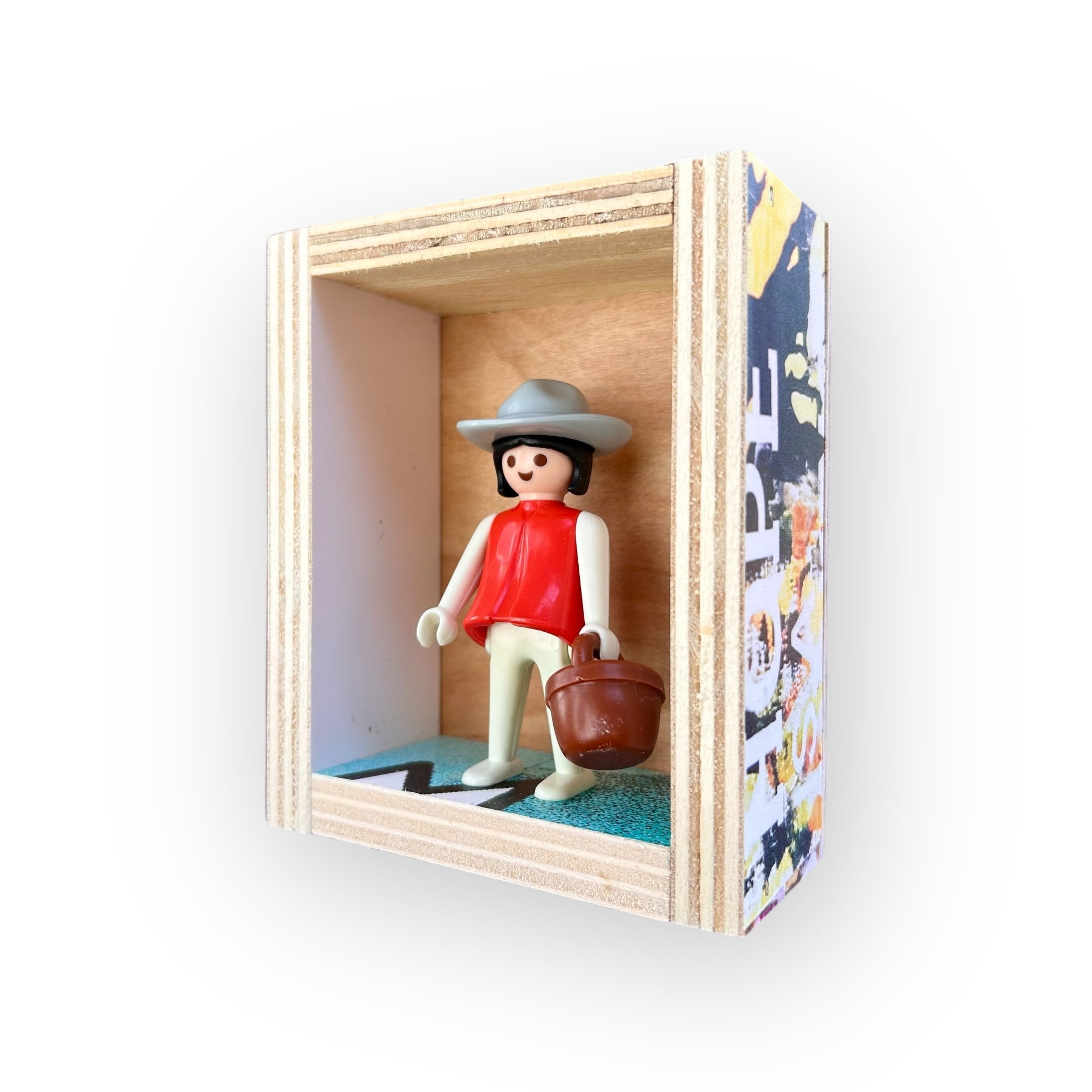 Playmobil huisje 'meisje grijze hoed en emmer'